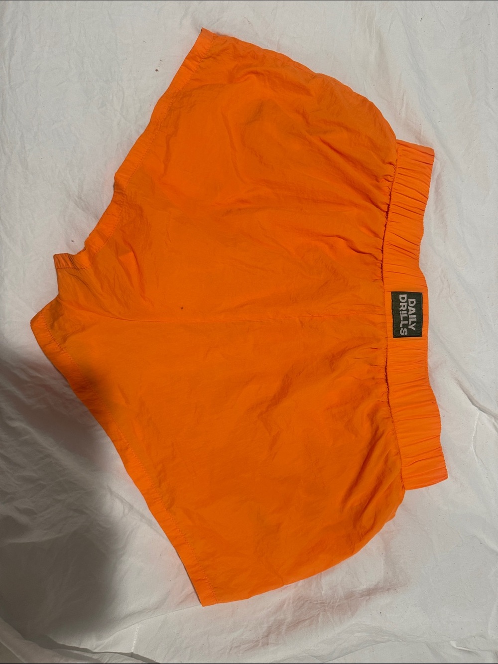 Daily Drills Neon Orange Running Shorts